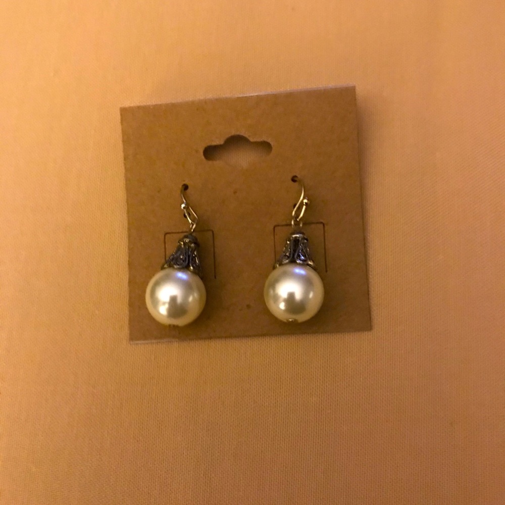 Pierced earrings. New; never worn.